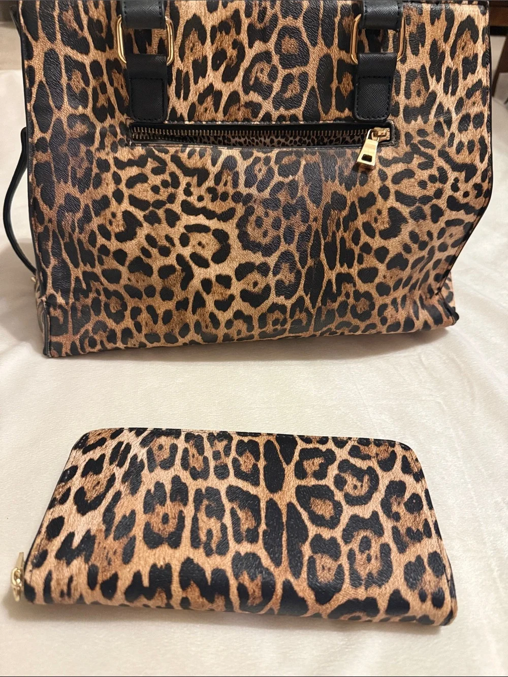 Leopard Print Tote Bag with Black Handles and Gold Hardware. The wallet included